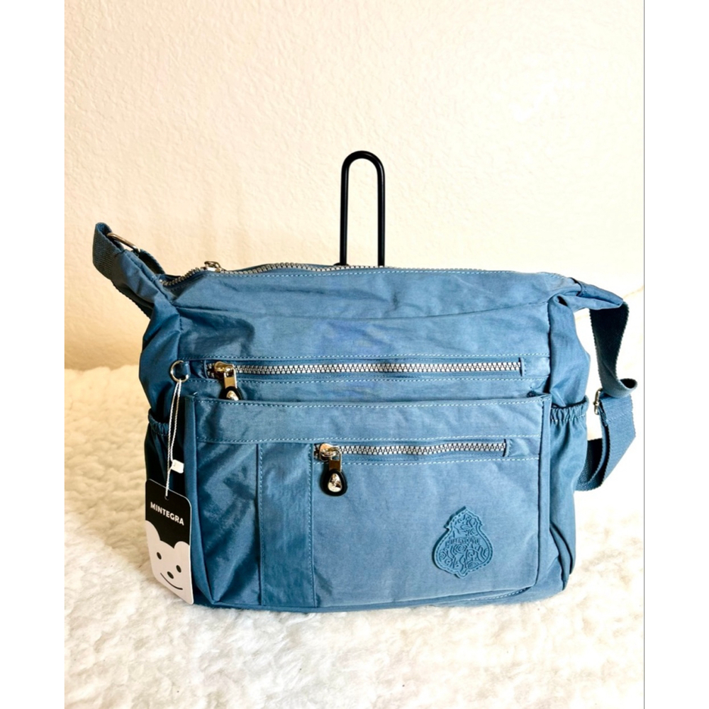 NWT Mintegra women's nylon waterproof crossbody bag in blue